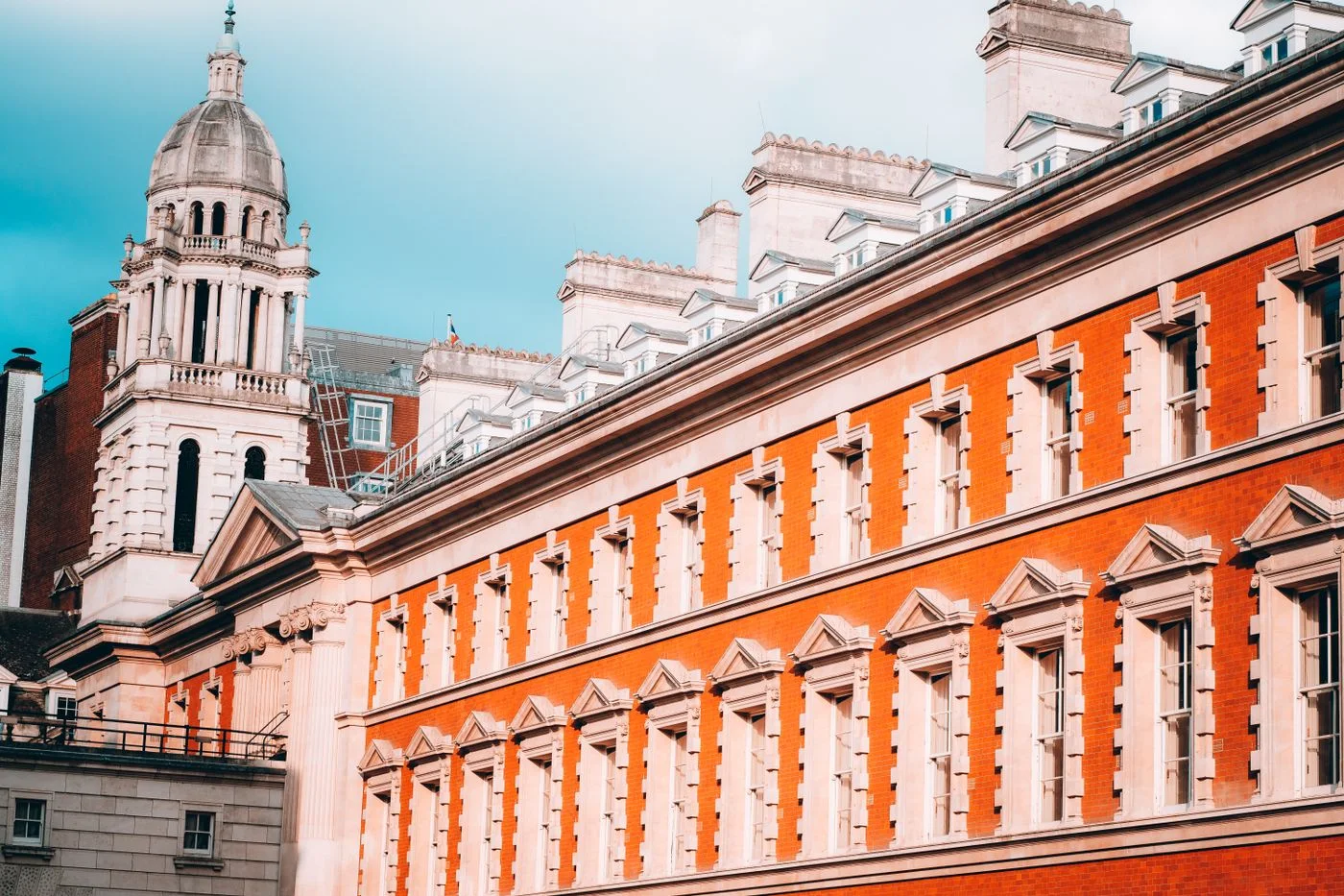 Facade of Old Admiralty Building in London with clear blue sky and classic architecture.