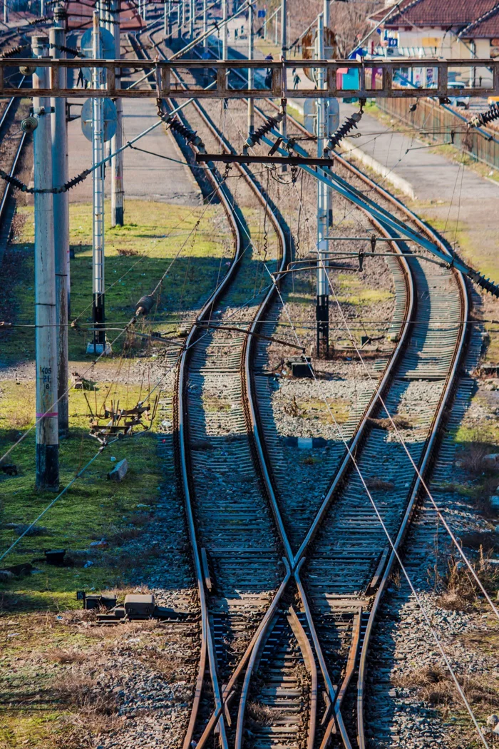 Overhead view of railway tracks with switches, capturing a complex network.